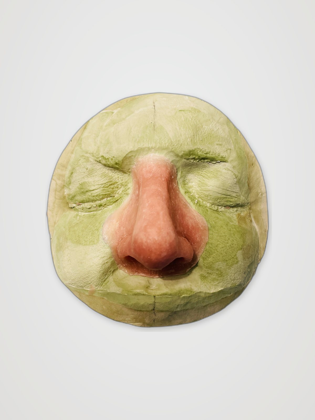 Hand-crafted silicone nasal prosthesis on its mold